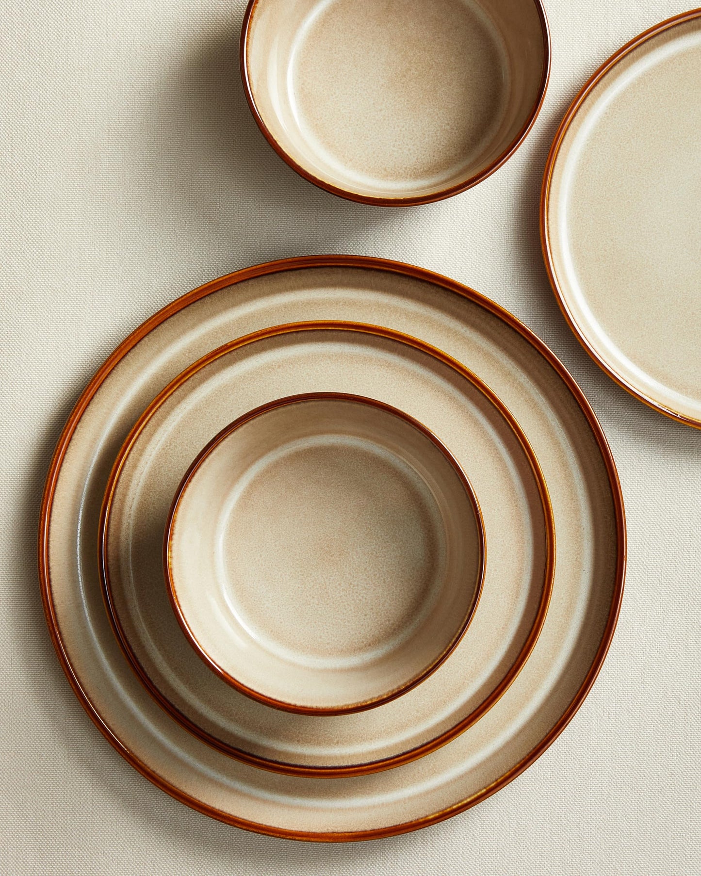 Pokini Stoneware Dinnerware Set for 4, 12PCS Plates and Bowls Set, Microwave & Dishwasher Safe Dinner Set, Modern Handmade Durable Dish Sets, Amber Brown